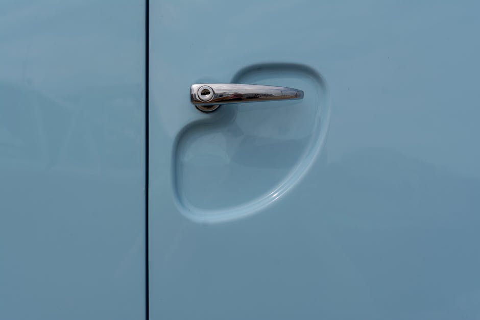 Close up of a modern interior door handle and smooth finish